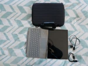 Surface Pro, keyboard, cable for watch, cable for external hard drive
